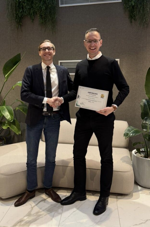 IACBAM certification ceremony handshake